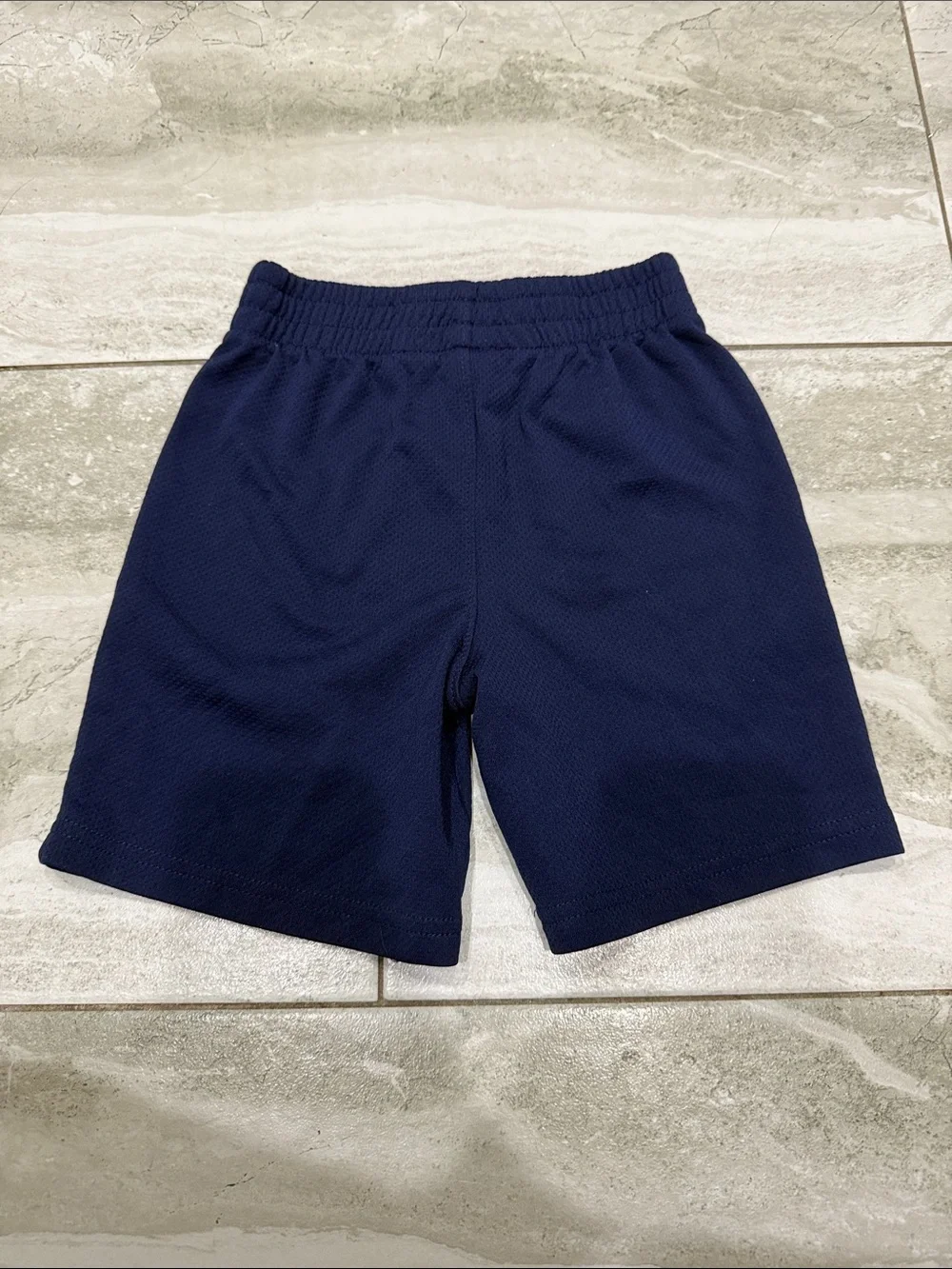 Puma Kids Navy Shorts with Red Puma Logo